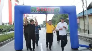 Diguyur Hujan, Masyarakat Tumpah Ruah Ikuti Karhutla Fun Run Polres Kepulauan Meranti 2025