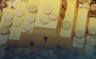 Harga Emas Turun Tipis di Tengah Spekulasi Kebijakan Hawkish The Fed